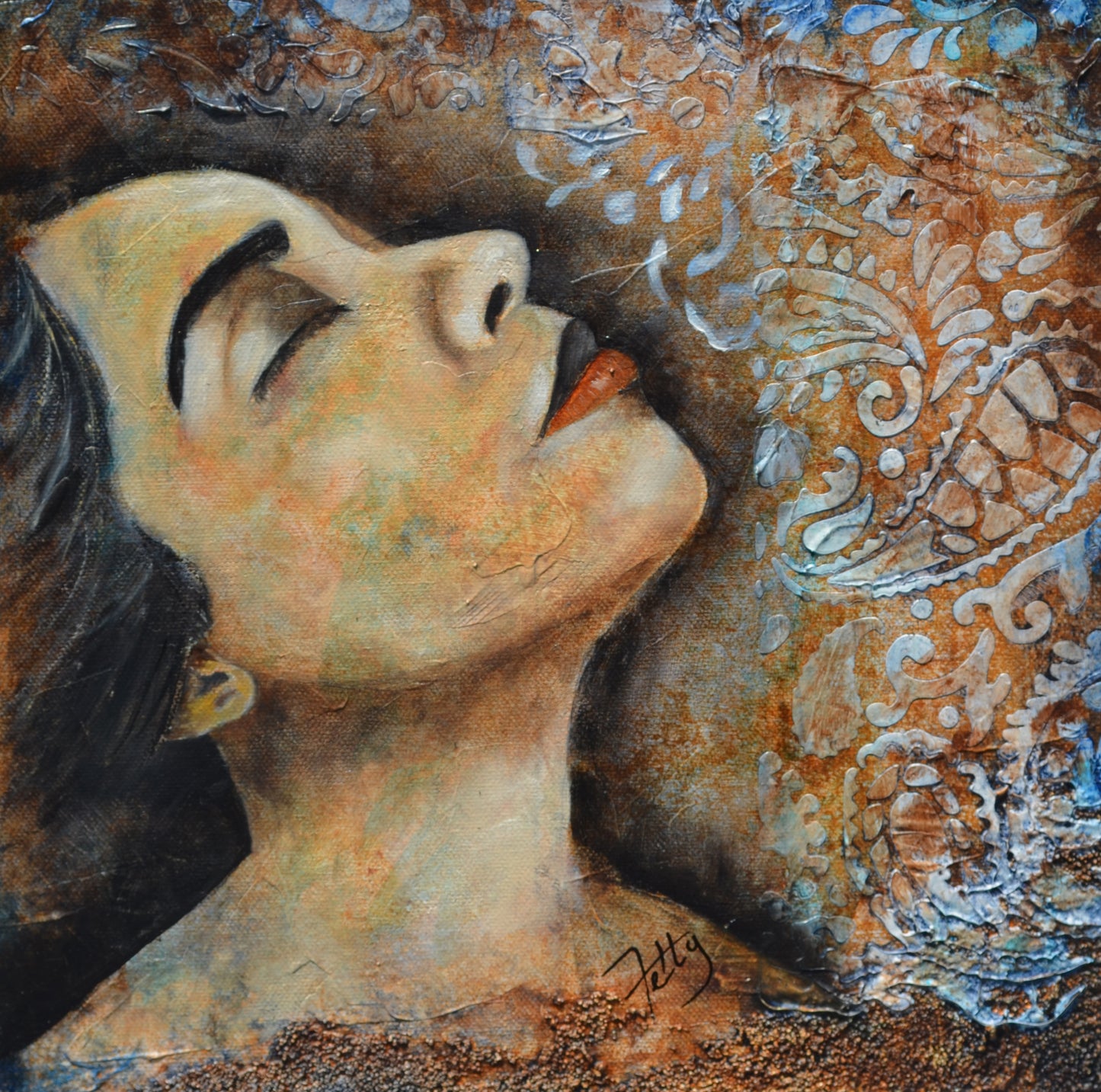 Original mixed media portrait painting titled, "Dreamer" of a woman with her head tilted towards the sky, eyes closed. She appears peaceful as if dreaming. The background has a 3d textured paisley pattern. Entire painting uses a natural rust color palette.